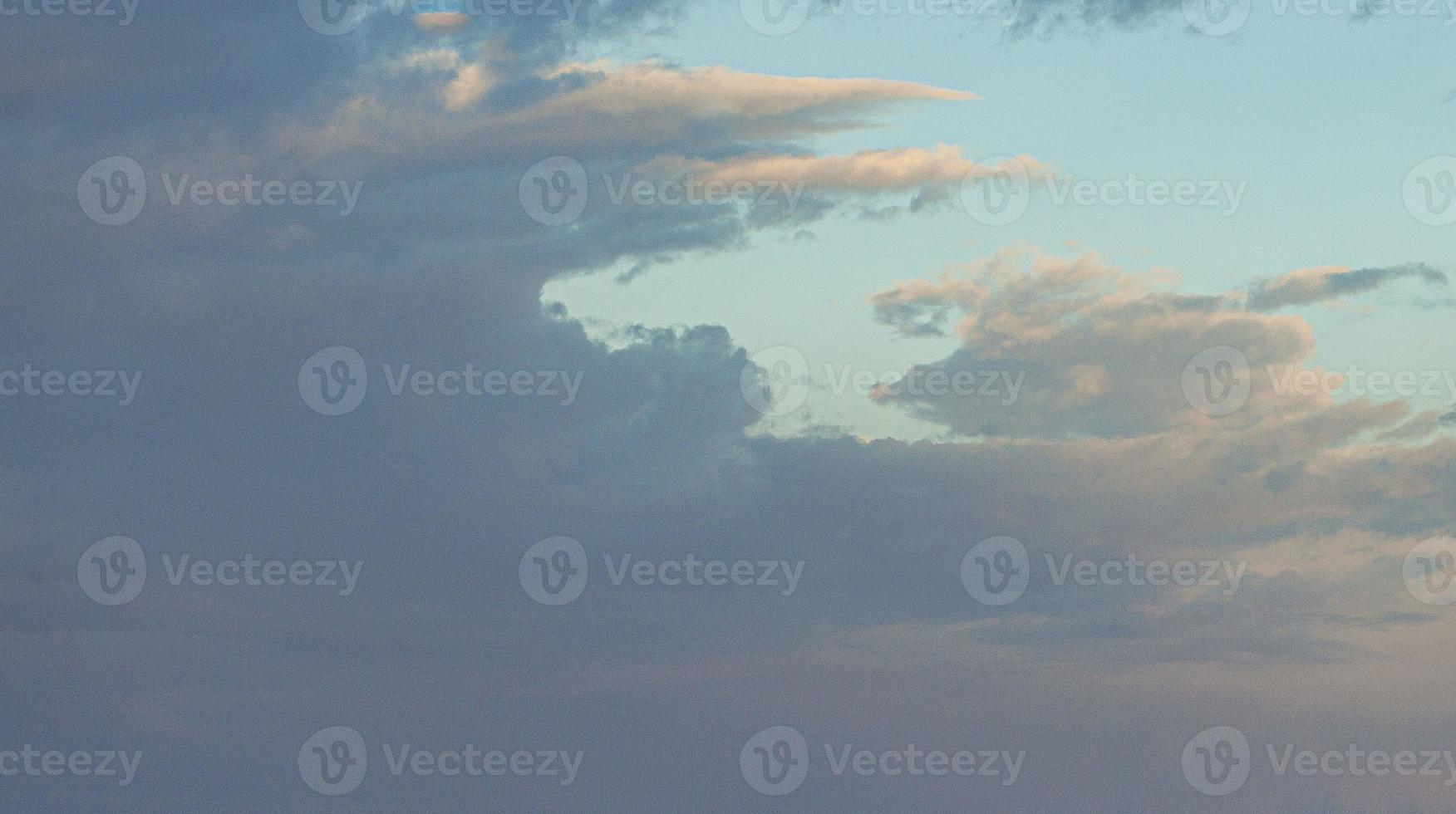 Image of a partly cloudy and partly clear sky during the day photo