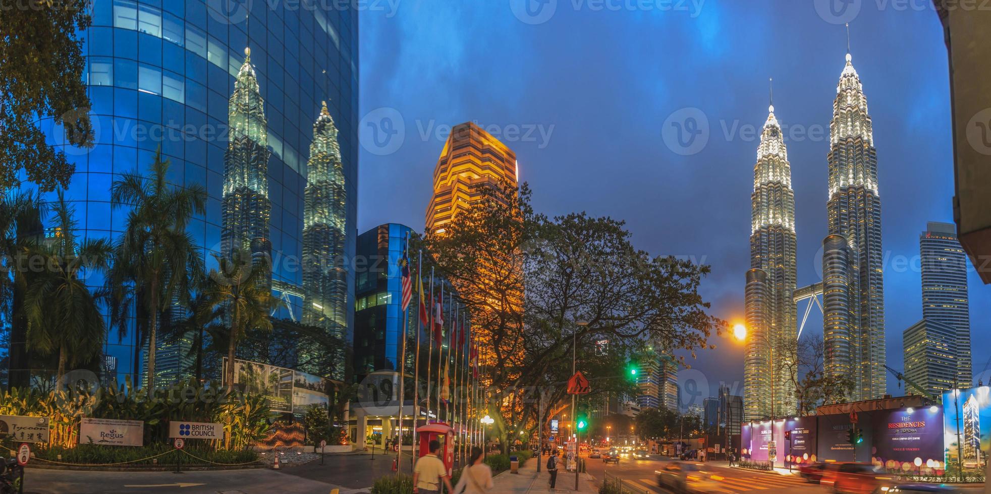 Reflection in a glass facade of a high-rise building photo