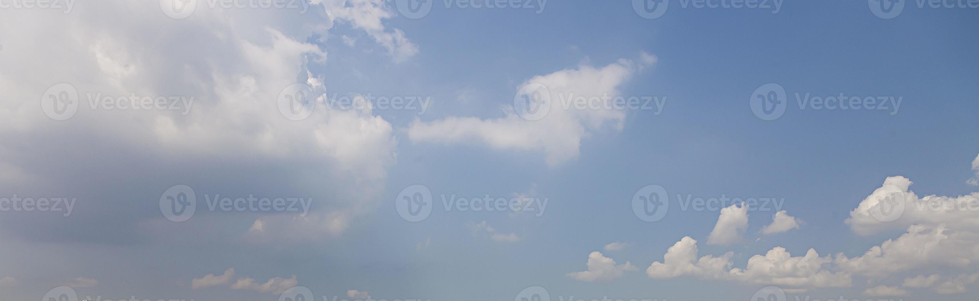 Image of a partly cloudy and partly clear sky during the day photo