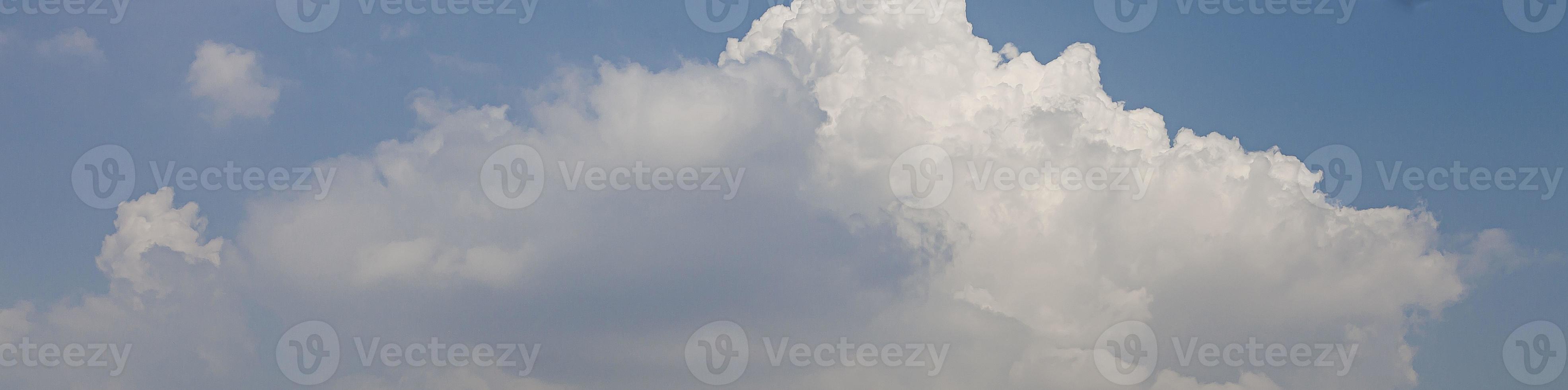 Image of a partly cloudy and partly clear sky during the day photo