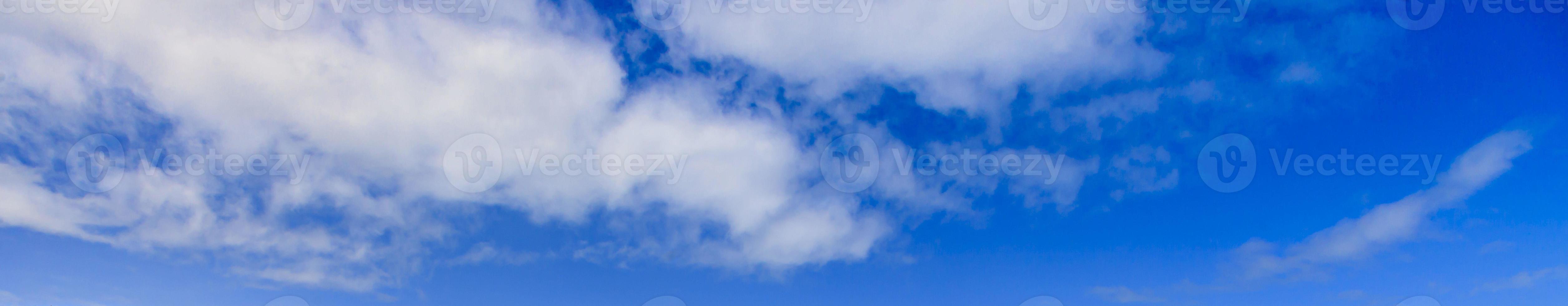 Image of a partly cloudy and partly clear sky during the day photo