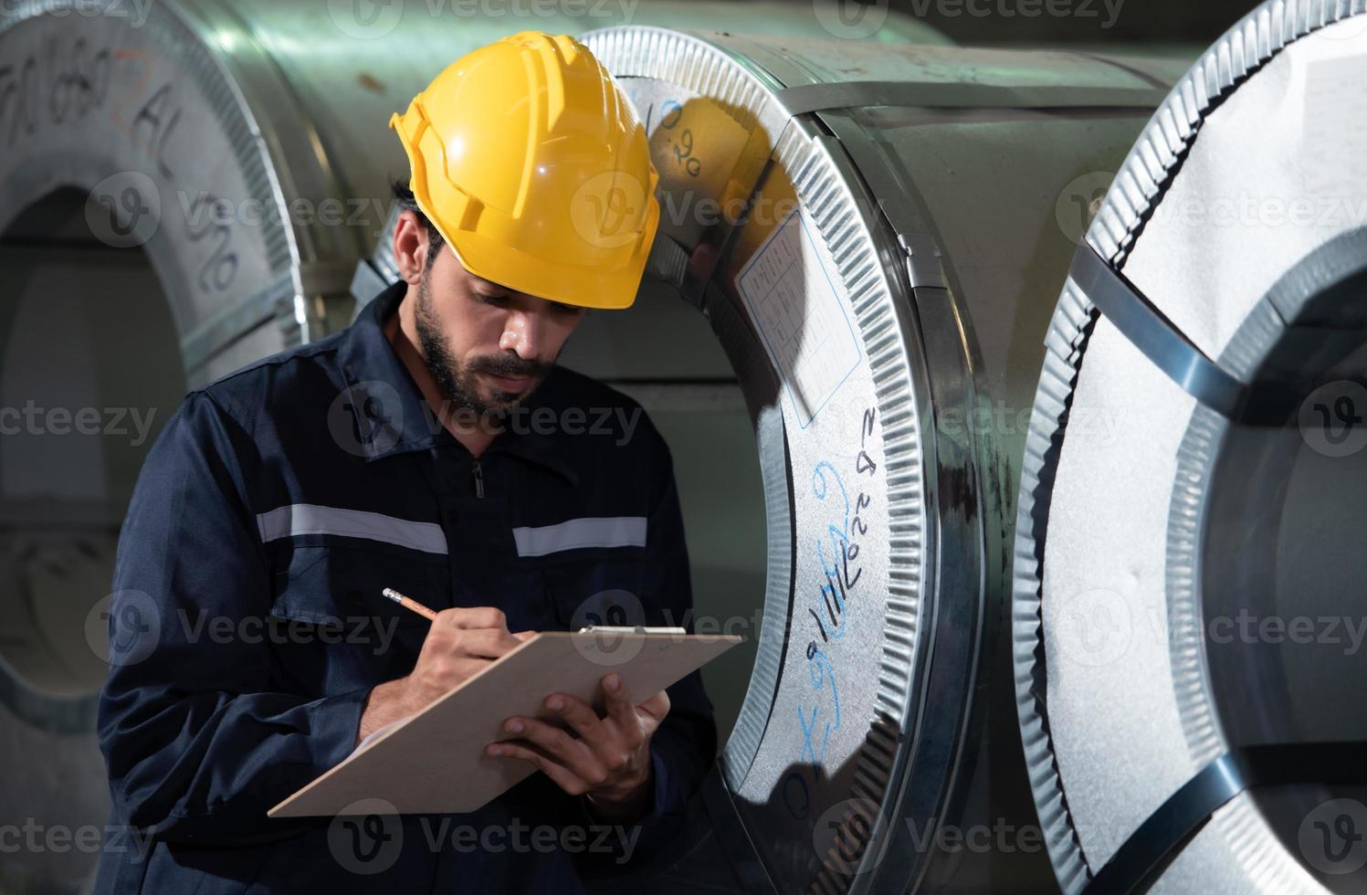 Portrait of a heavy equipment male engineer from a huge industry photo