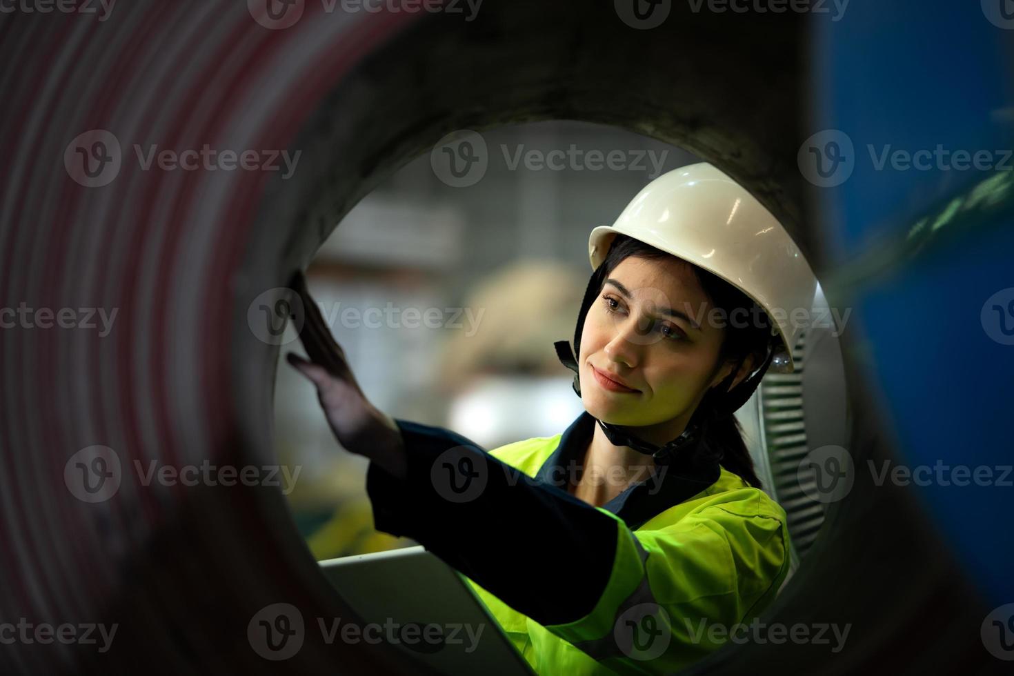 Portrait of a heavy equipment female engineer from a huge industry photo