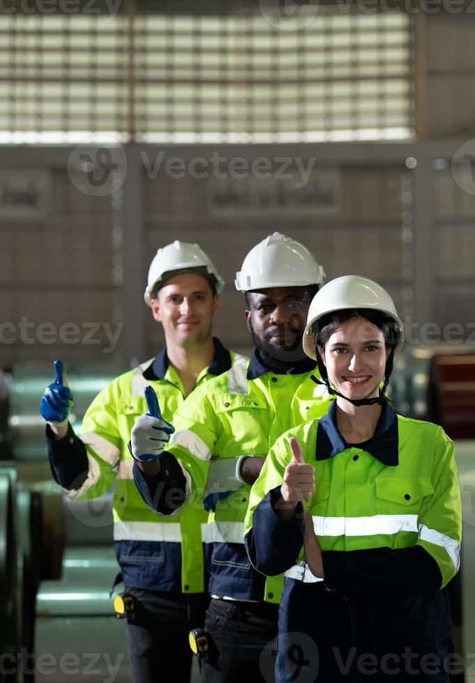 Portrait of a heavy equipment group of engineer from a huge industry photo