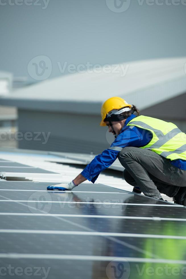 Engineer in charge of solar panel installation The installation of solar energy photo