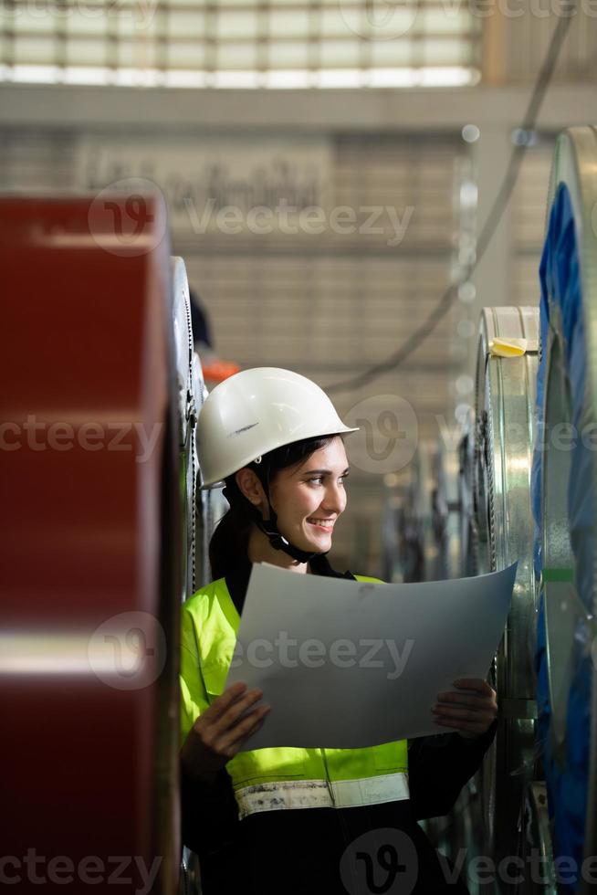 Portrait of a heavy equipment female engineer from a huge industry photo