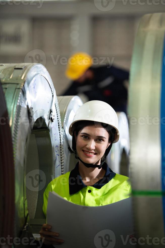 Portrait of a heavy equipment female engineer from a huge industry photo