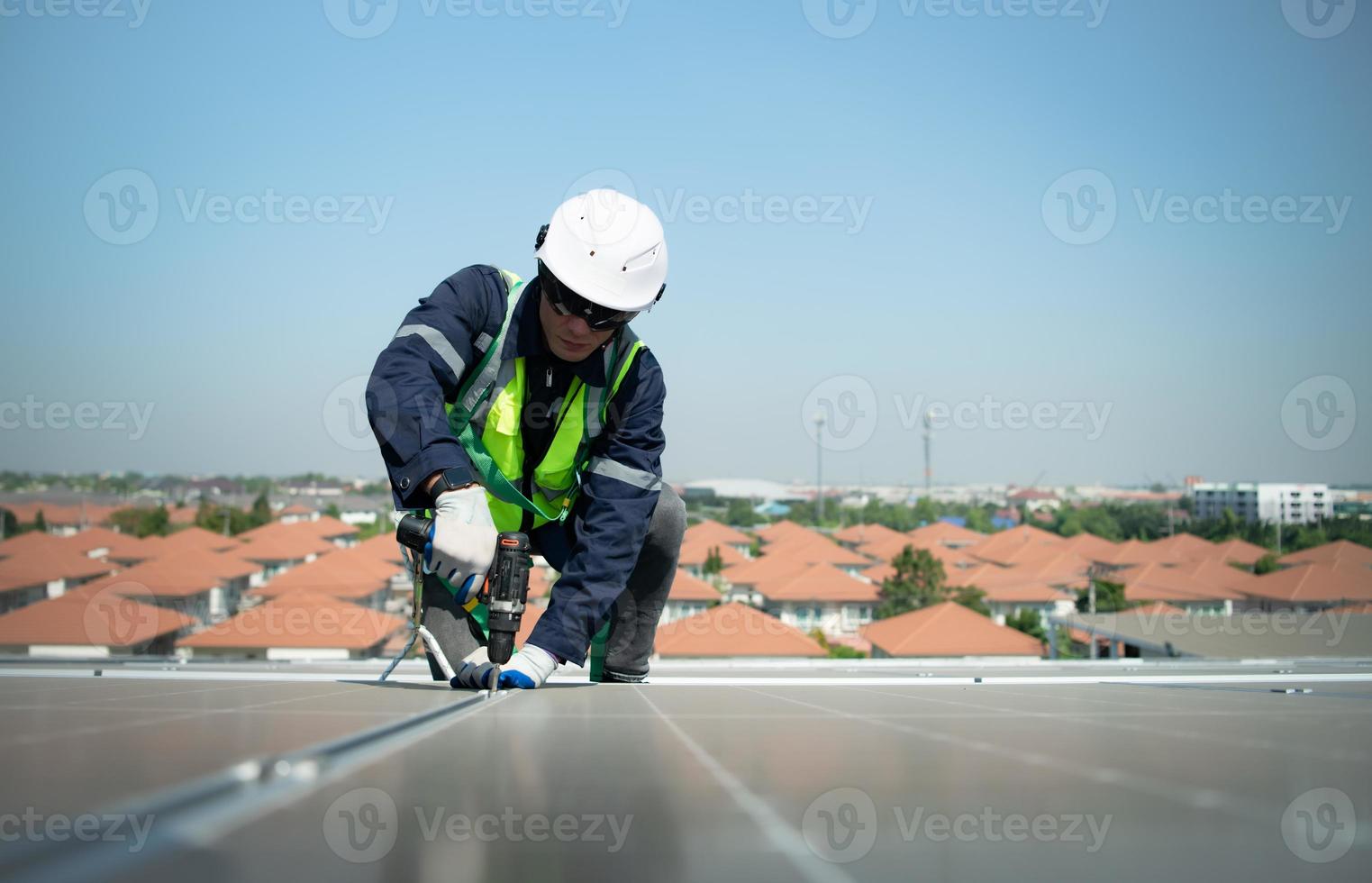 Engineer in charge of solar panel installation The installation of solar energy photo