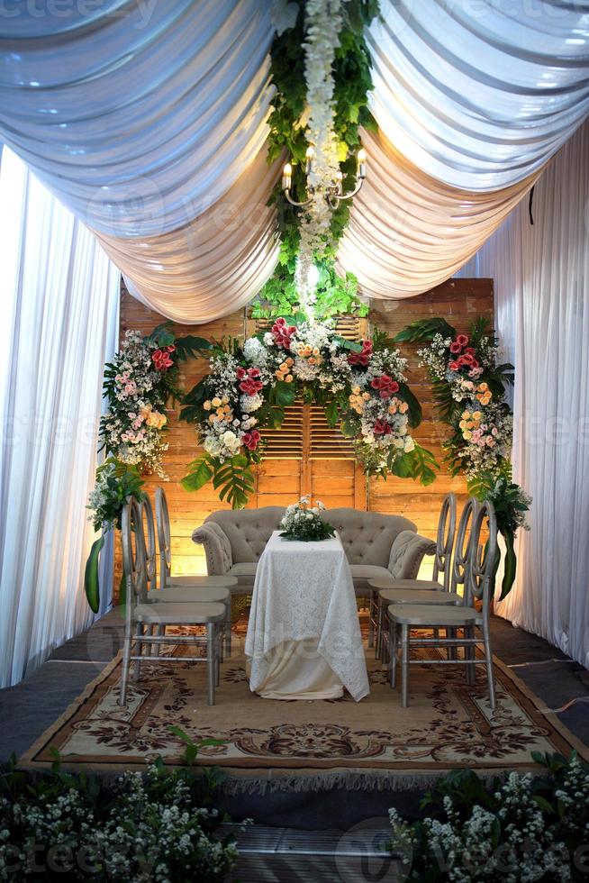 Beautiful Islamic Wedding Ceremony in Indonesia Decoration with Tables and Chairs photo