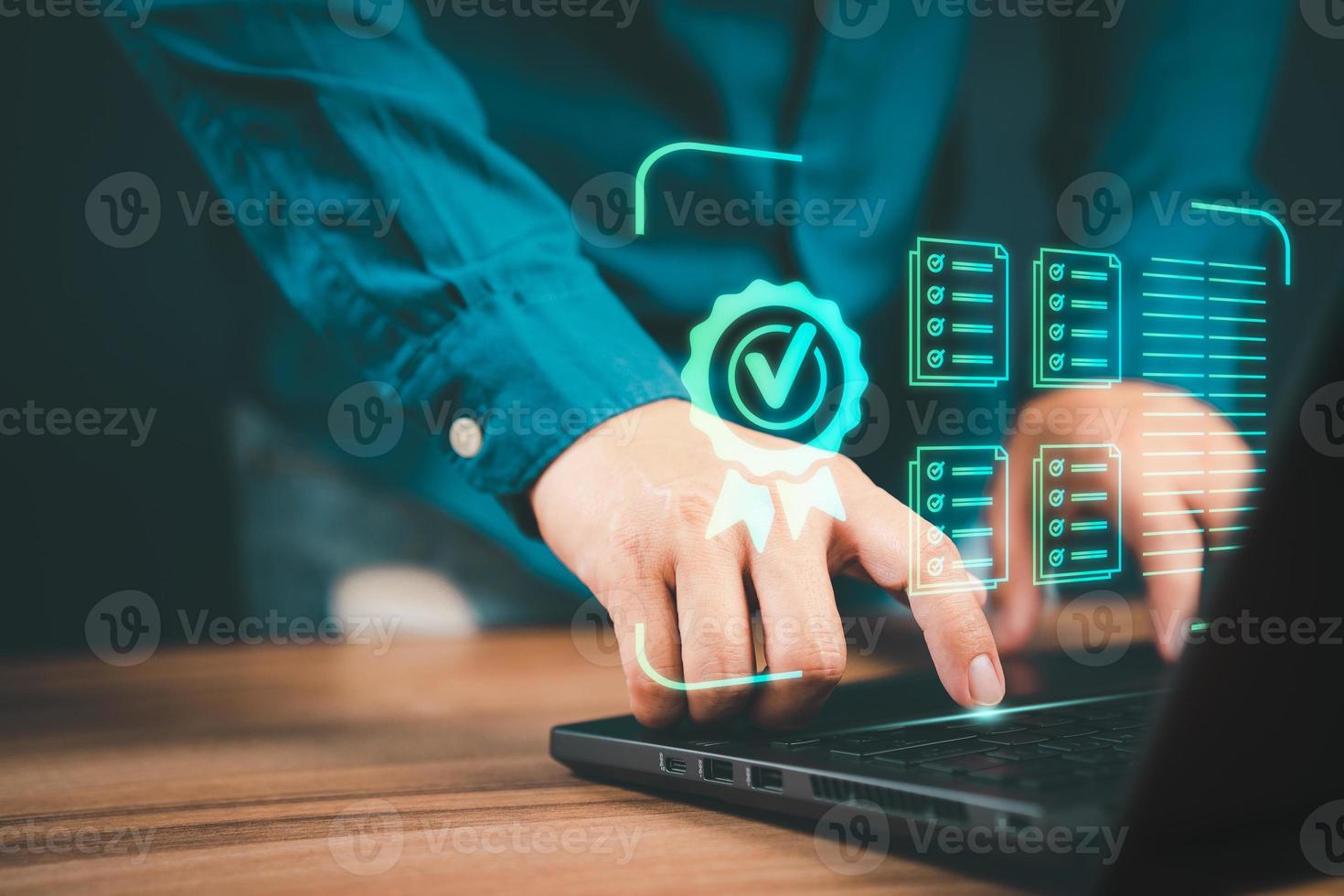 Businessman working with sign of the top service quality assurance on virtual screen. Guarantee, Standards, ISO certification and standardization concept. photo