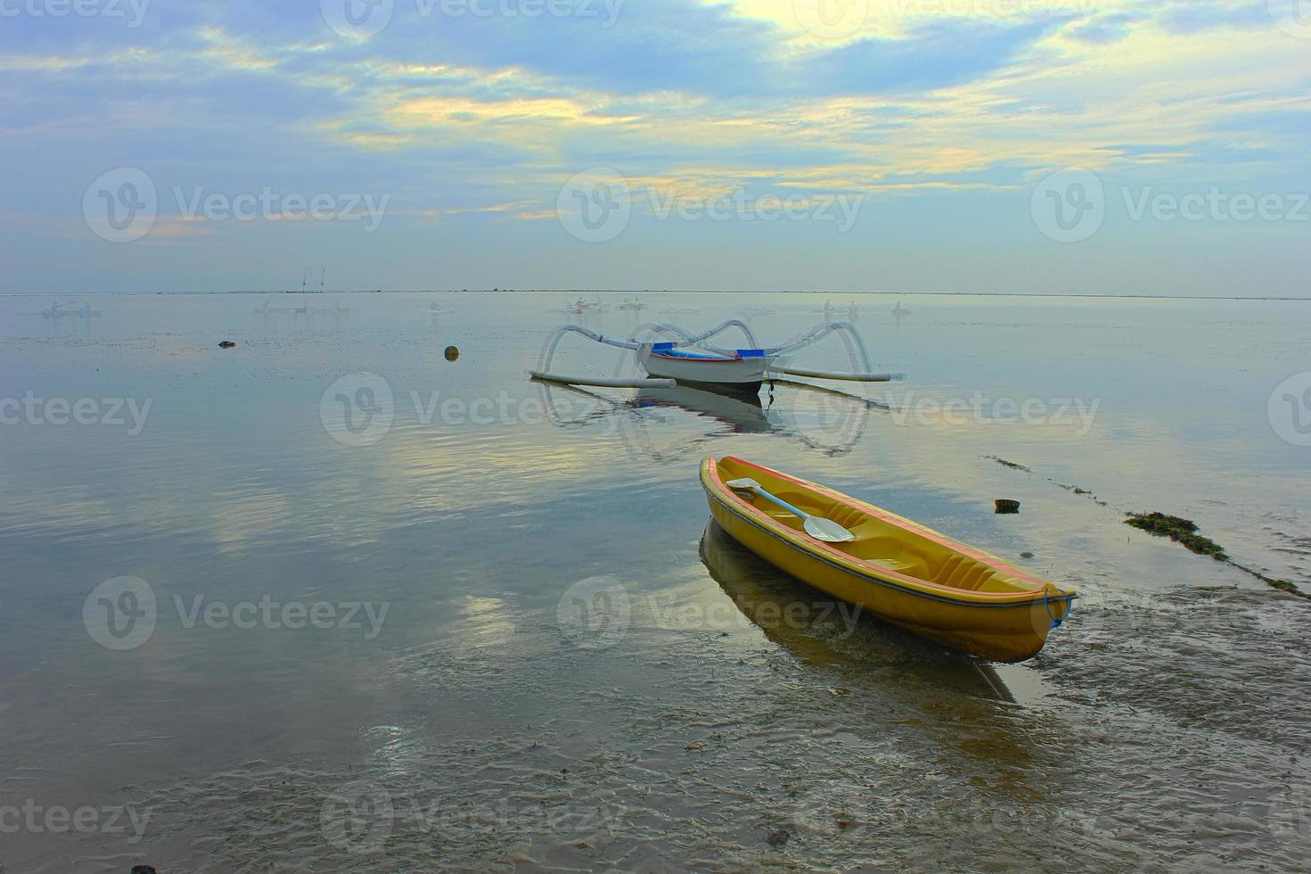 View of a fishing boat on the beach. photo