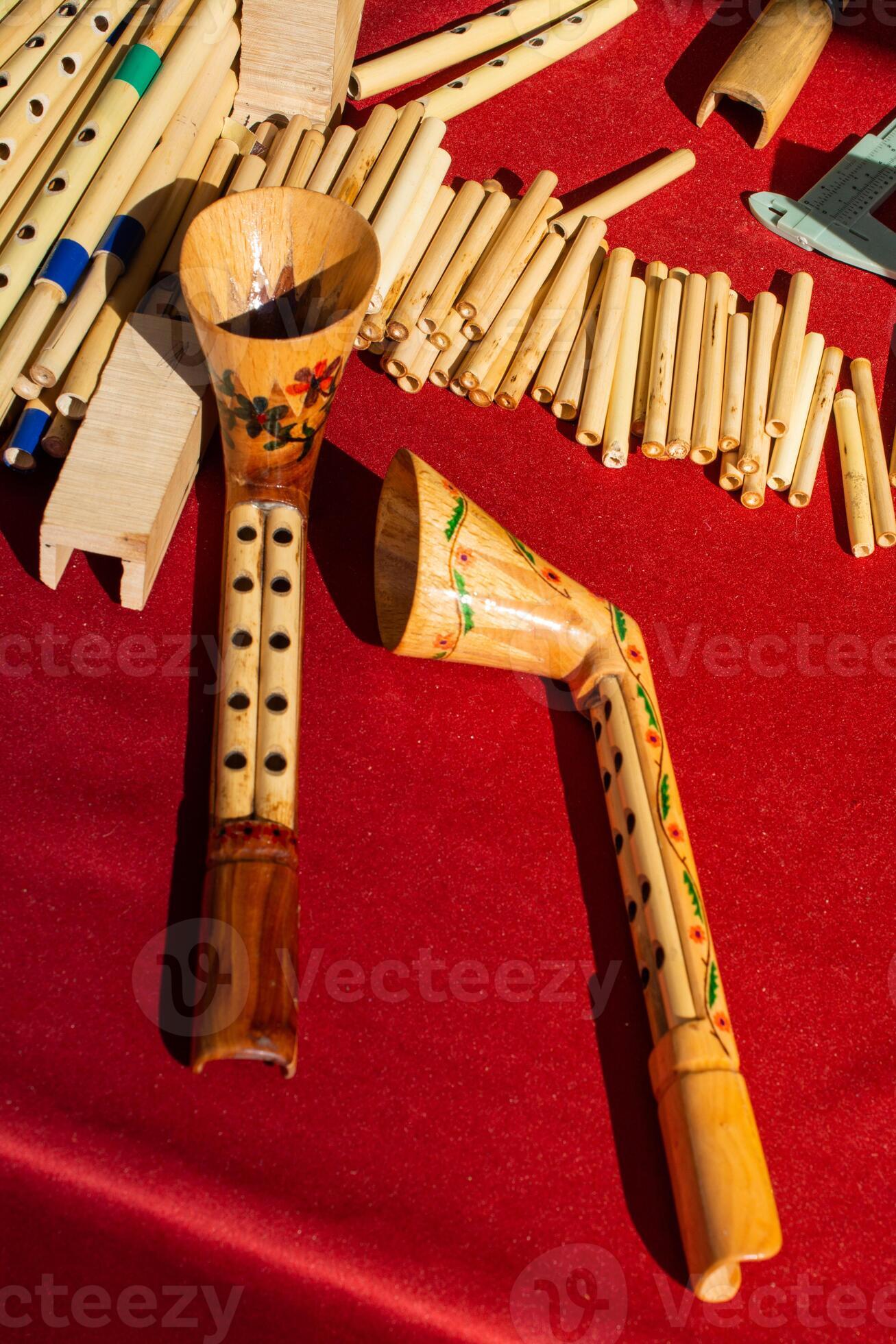 Dozens of handmade bamboo flutes in display 16750151 Stock Photo at