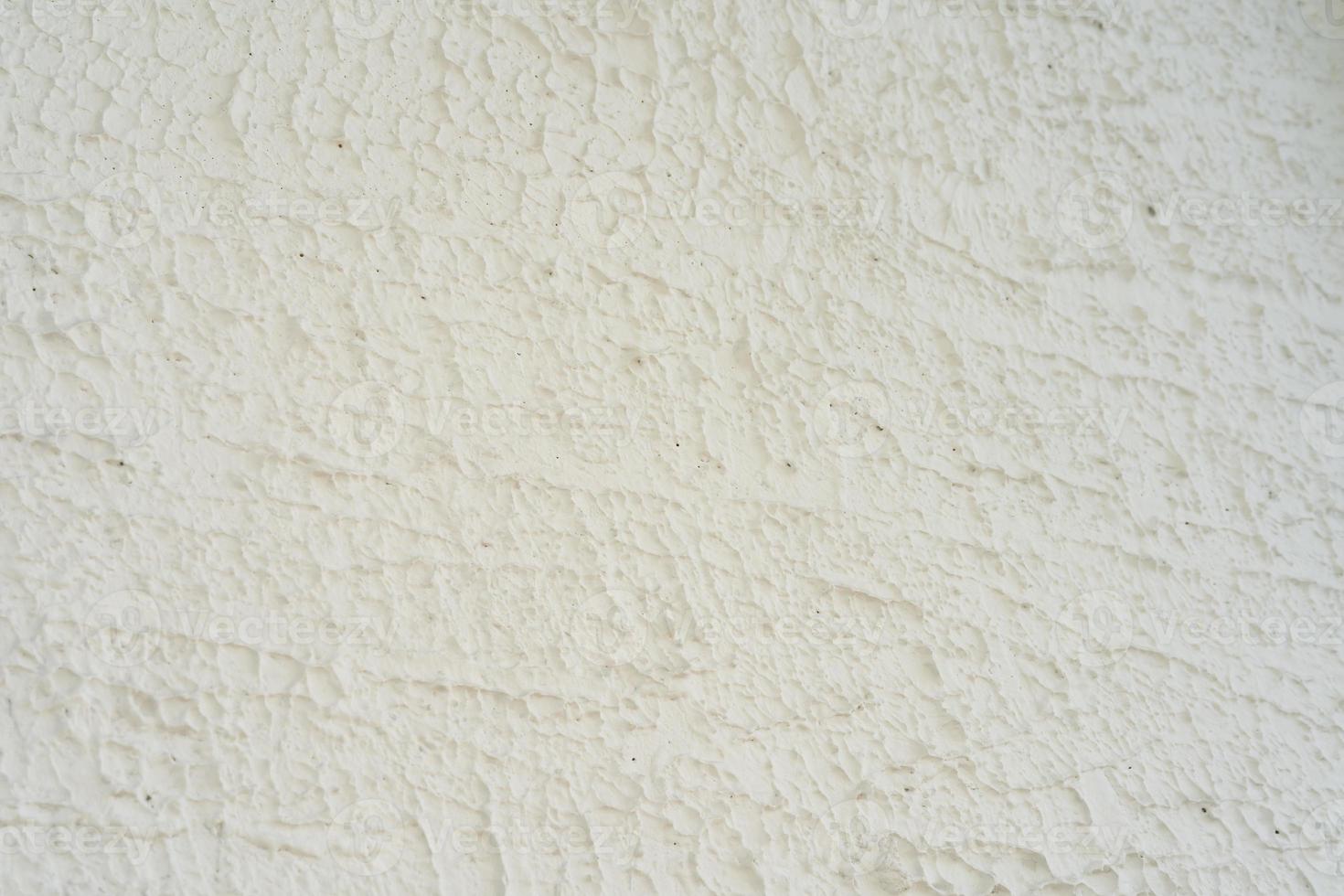 Gray uneven cement wall with trowel marks. Design solutions in the loft interior and repair. Space for text. Background. Rough surface from uneven cement wall. photo