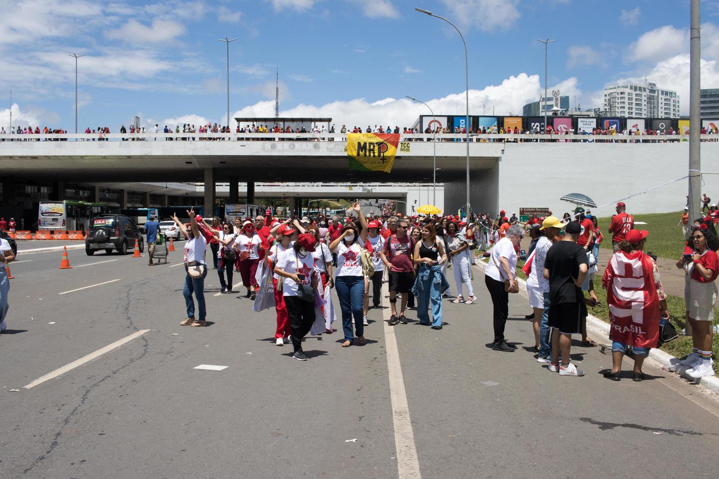 Brasilia, Brazil Jan 1 2023 Crowds of People Heading down the Esplanada towards the National Congress for the Inauguration of President Lula in Brasilia photo