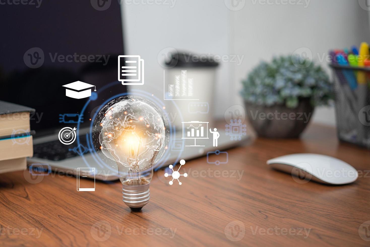 Bright lightbulb glowing with learning icons for study knowledge to creative thinking idea. Business success idea of learning, planning or working. Education solution or training skill concept. photo