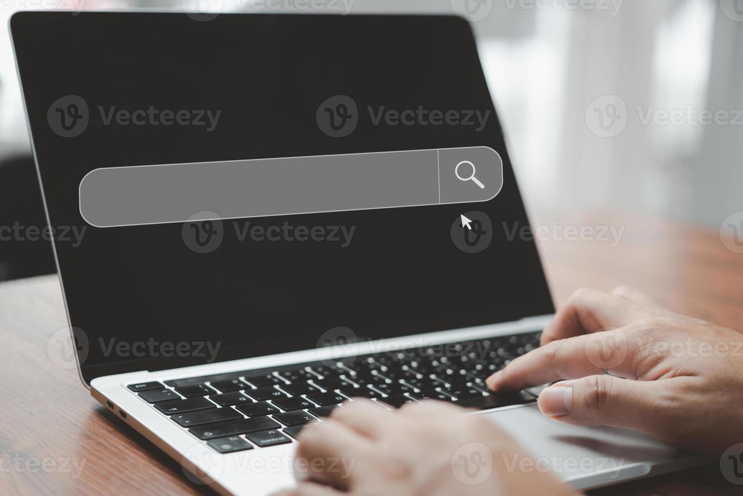 Businessperson using laptop searching Browsing Internet Data Information.Networking Concept Data Search Technology internet Search Engine Optimization. photo