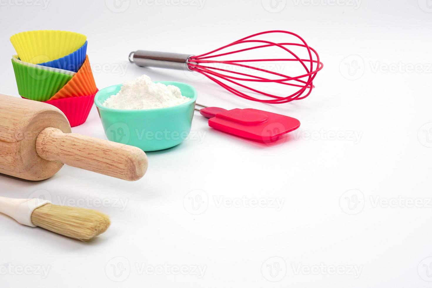 Top view set of kitchen utensils and ingredients for bakery on white background. Materials or kitchen equipment for bakery. photo