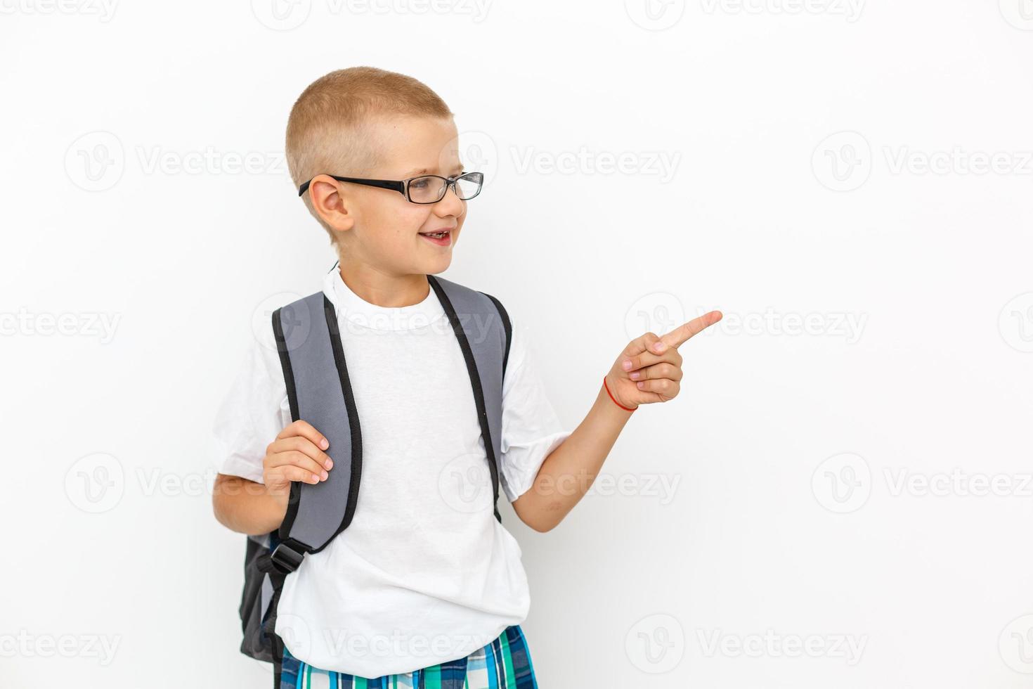 White T-shirt on a cute boy, isolated on white background photo