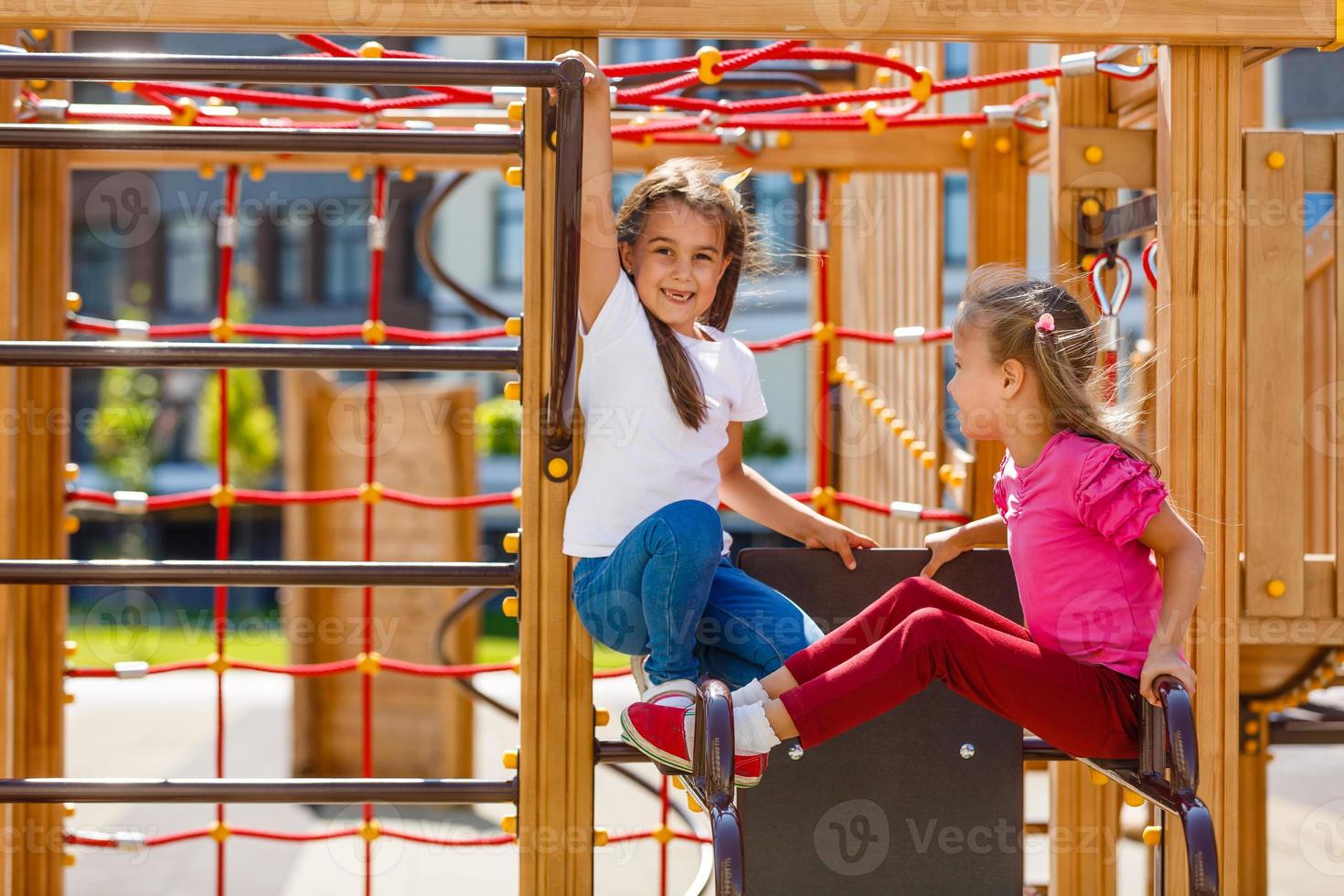 two little girls on the playground photo