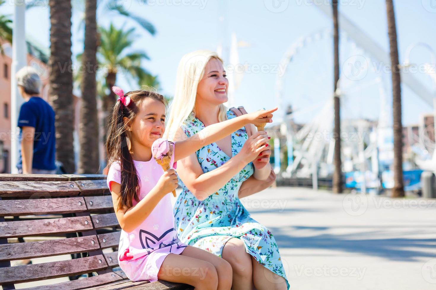 tourist mother and her daughter at the streets of Italy. Vacation concept with family. photo