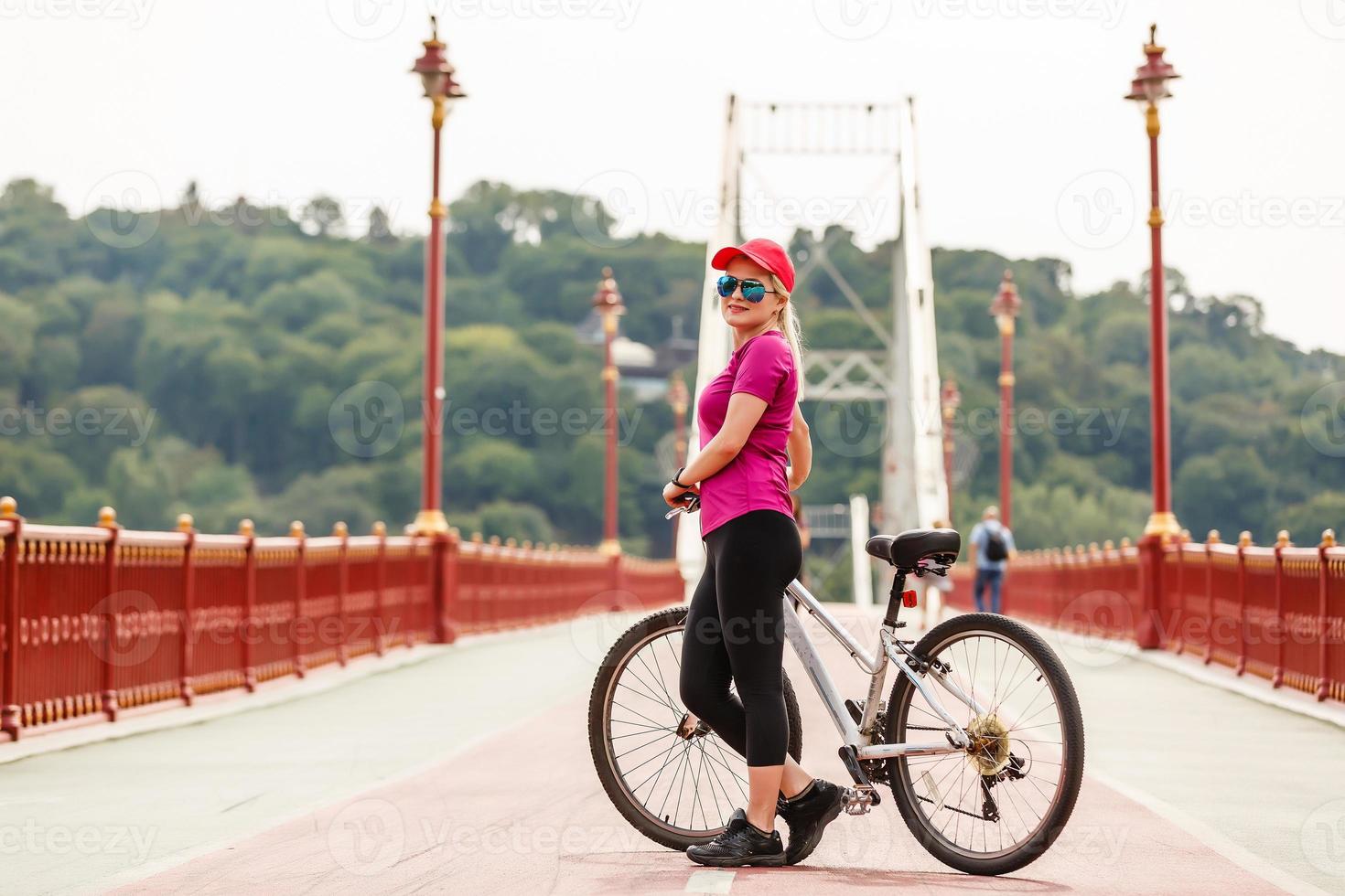 woman on bike on a summer day photo