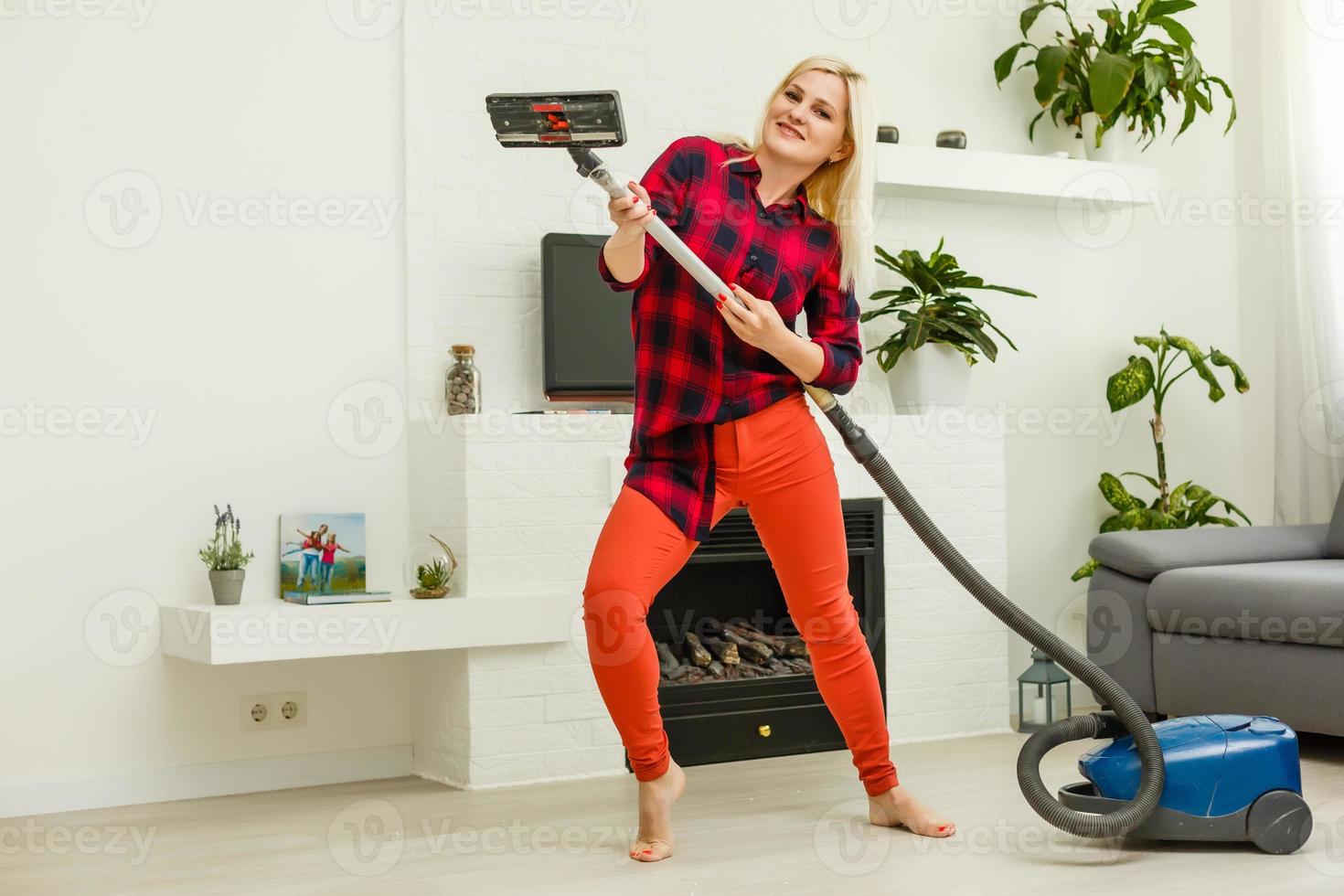 woman cleans the floor of the house photo