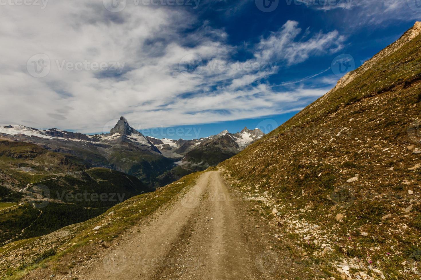 Amazing view of touristic trail near the Matterhorn in the Swiss Alps. photo