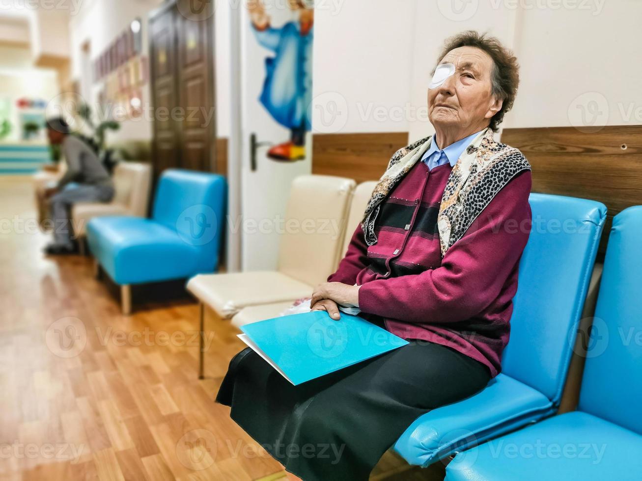 Elderly 95 years old woman beeing prepered for laser surgery at ophthalmology clinic. Age, vision, surgery, eyesight and people concept. photo