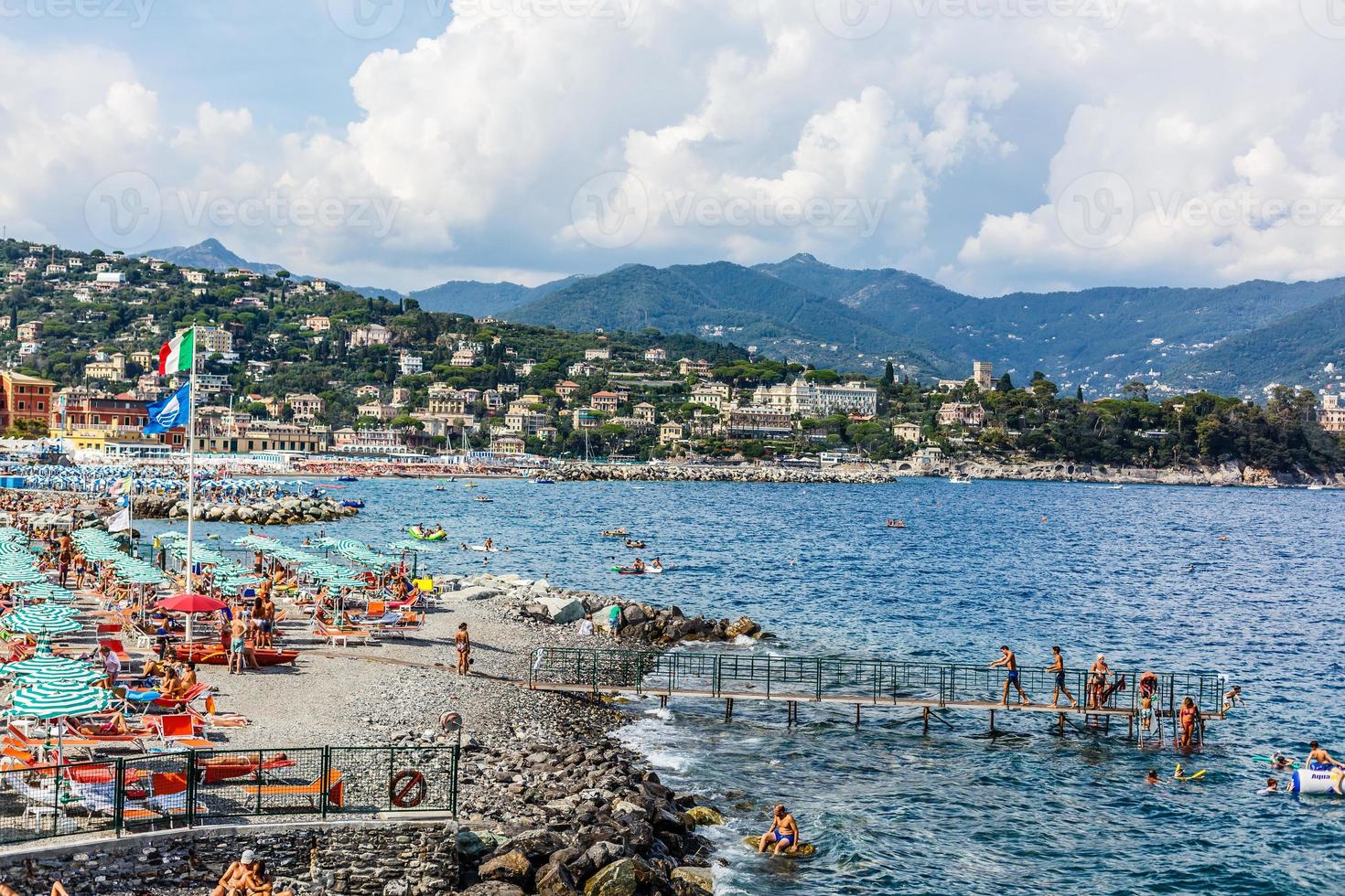 Landscape view of the little city and beach of Camogli in the mediterranean coast of Liguria in Italy photo