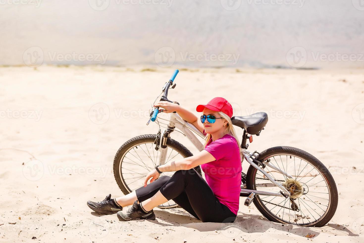 Bikes cycling girl. Girl rides bicycle. photo