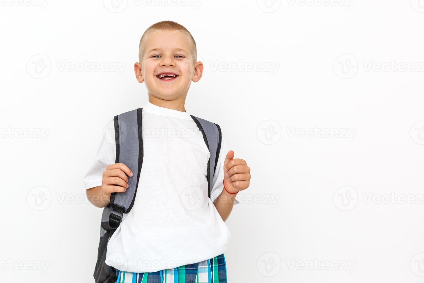 White T-shirt on a cute boy, isolated on white background photo