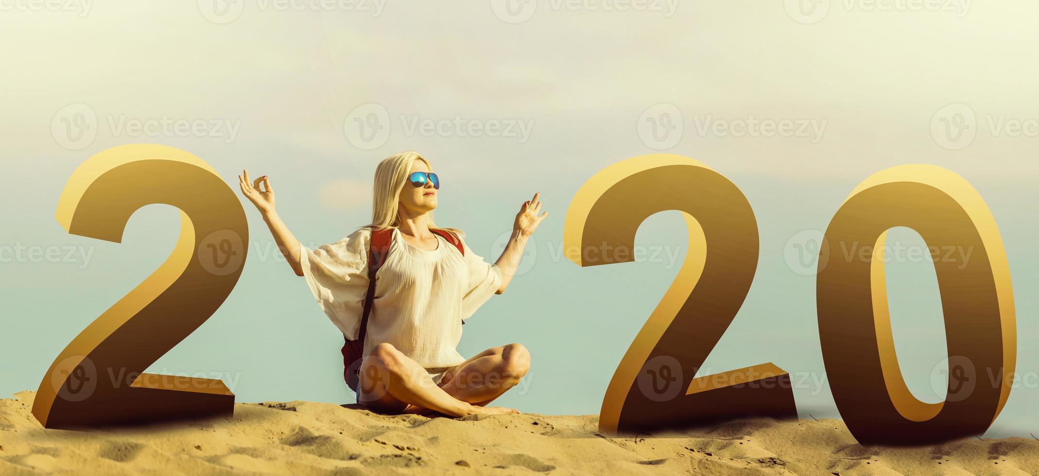 stylish beautiful smiling cheerful woman happy in desert sand dressed, travel safari on vacation, sunny summer day Happy New Year 2020 Numbers At Sunrise photo