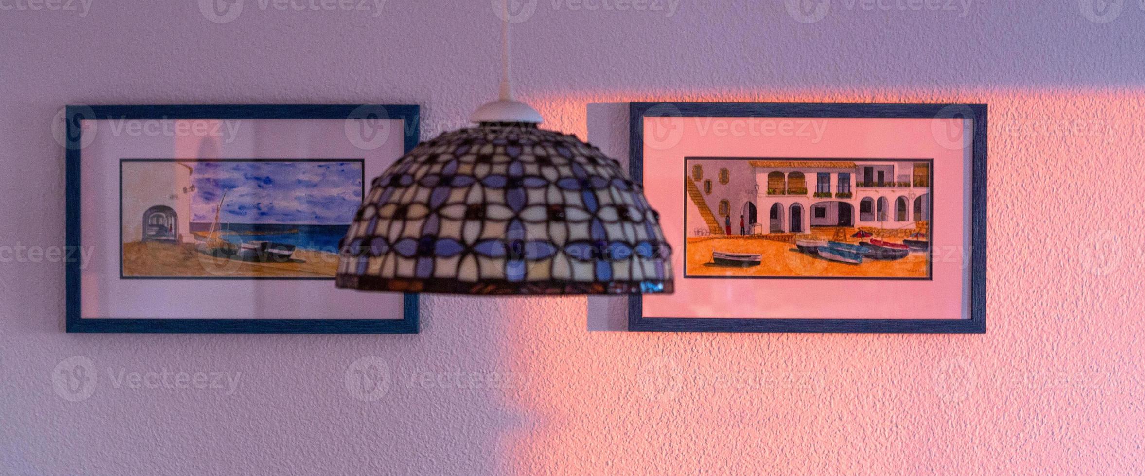 Shadows in the window in the light of the rising sun photo