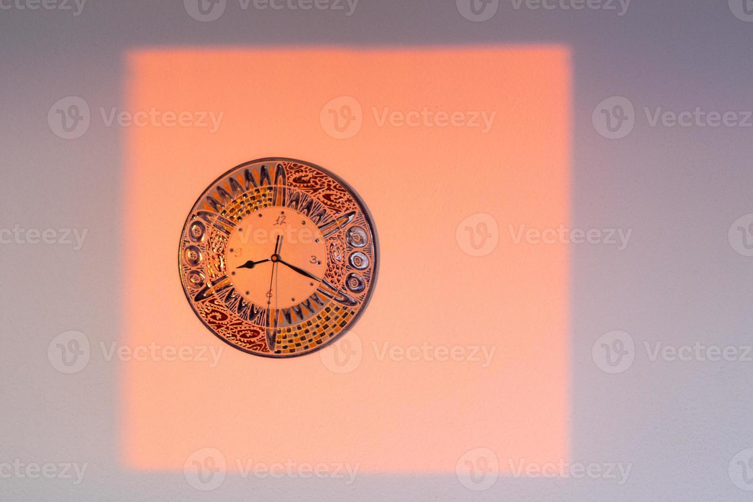 Shadows in the window in the light of the rising sun photo