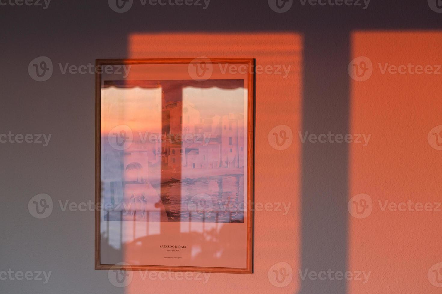 Shadows in the window in the light of the rising sun photo