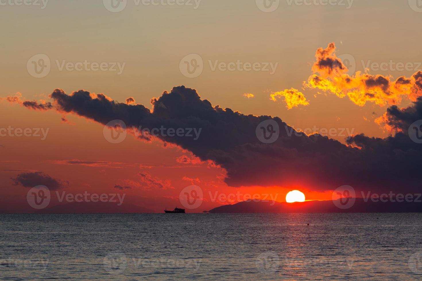 Sunset with dark clouds photo