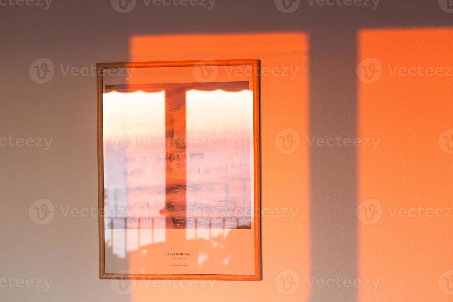 Shadows in the window in the light of the rising sun photo