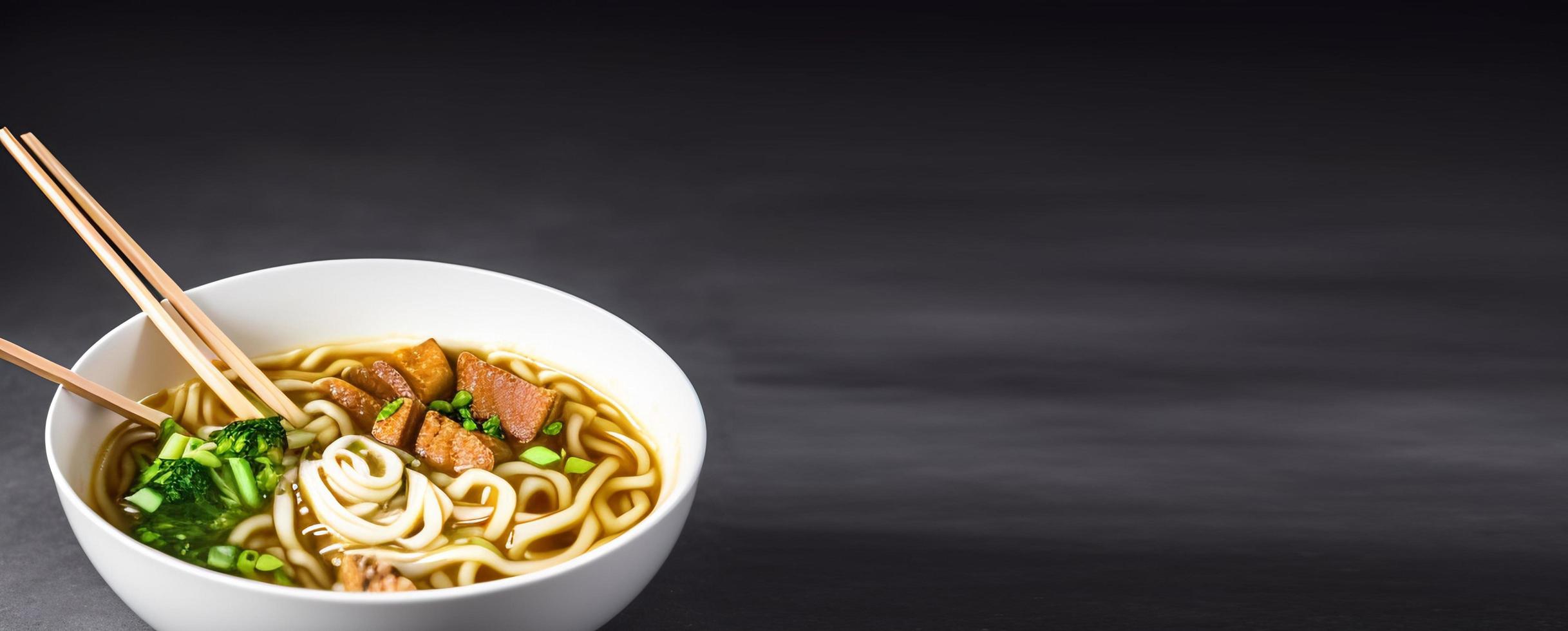 Delicious noodles. Fast food meal with appetizing pasta and chopsticks. photo