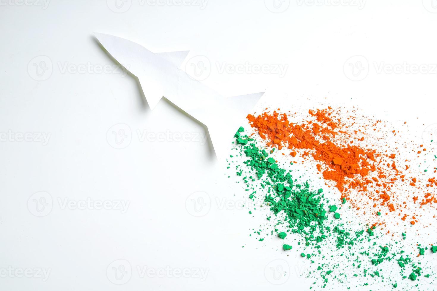 Concept for Indian Independence day and republic day, view of flying missile with tricolor on white background photo