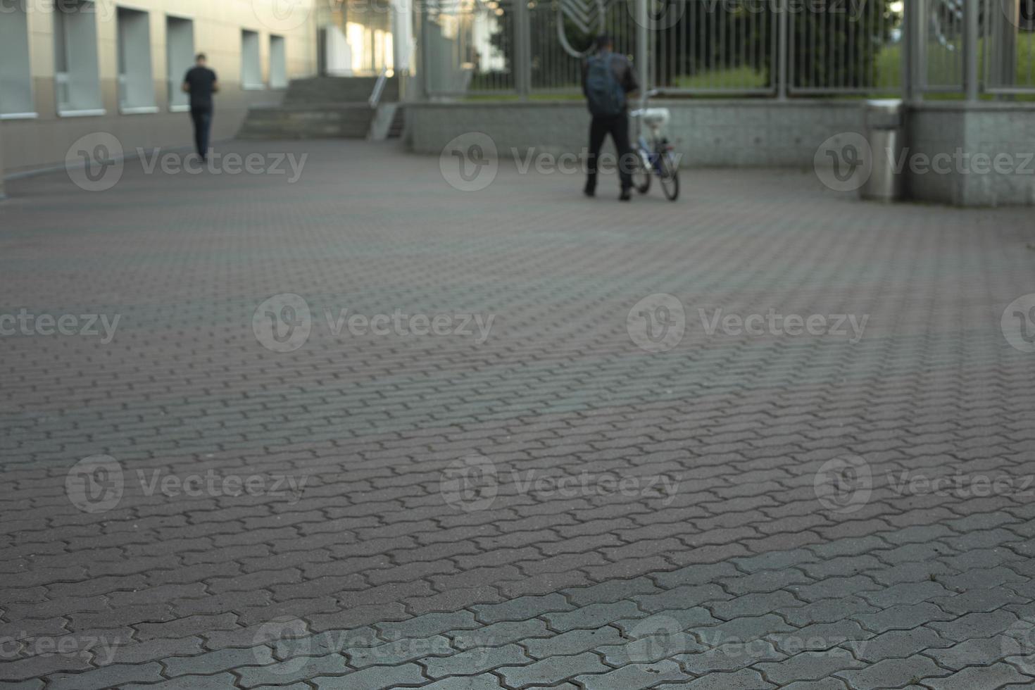 Area in city. Tile on road. Tile coating of area. photo