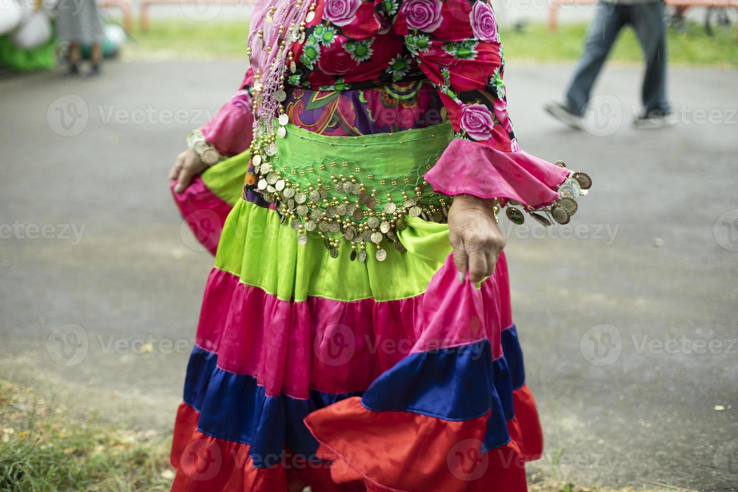 Folk costume. Party on street. Old-fashioned clothes. photo