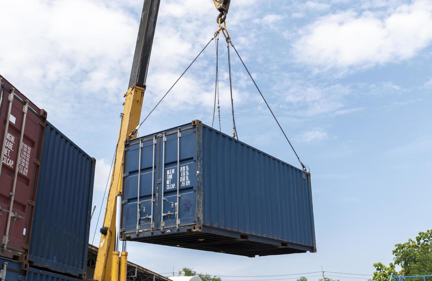 Crane lifting up container loading photo