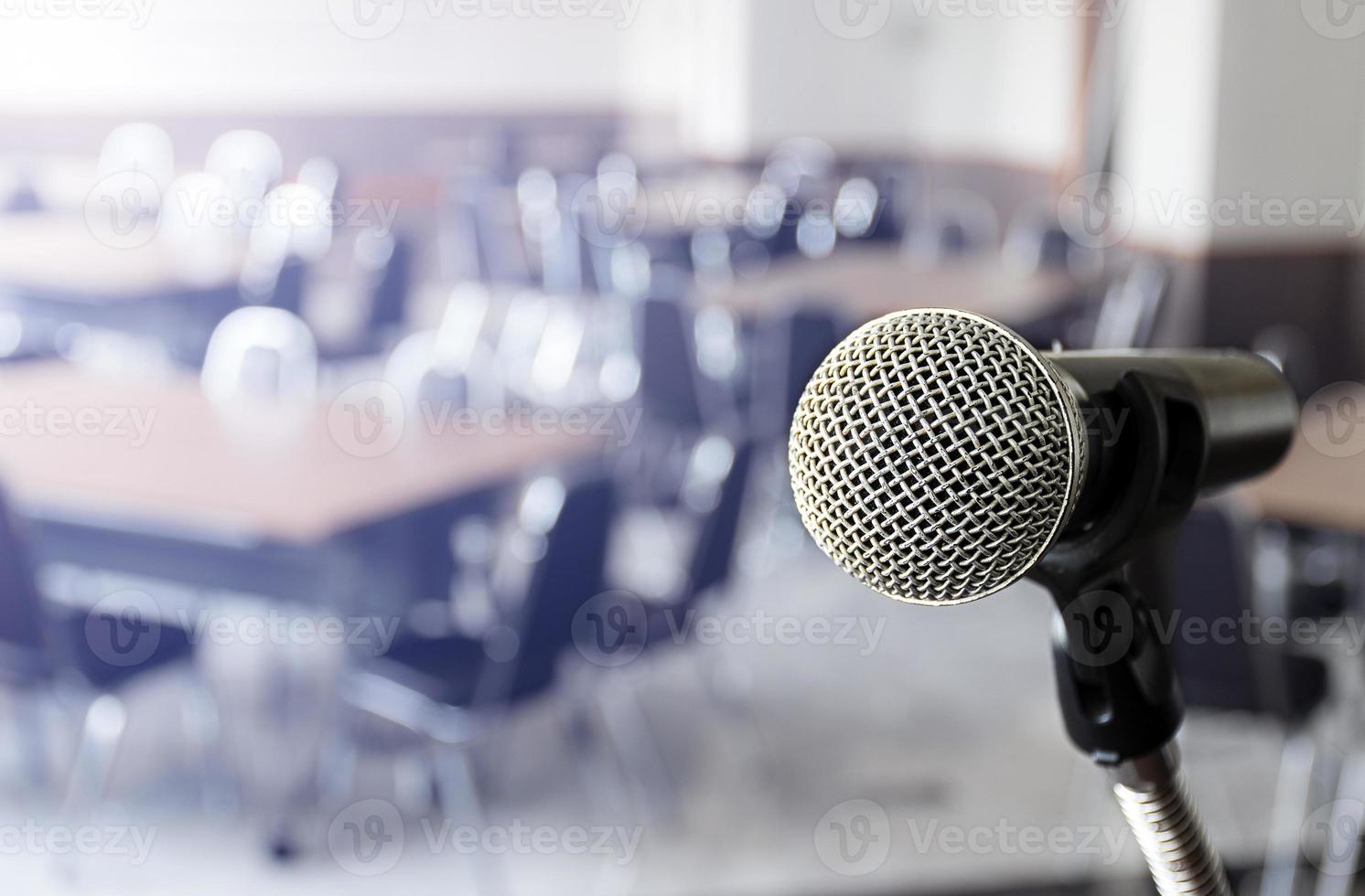 Close up microphone with tripod on stage in seminar room. photo