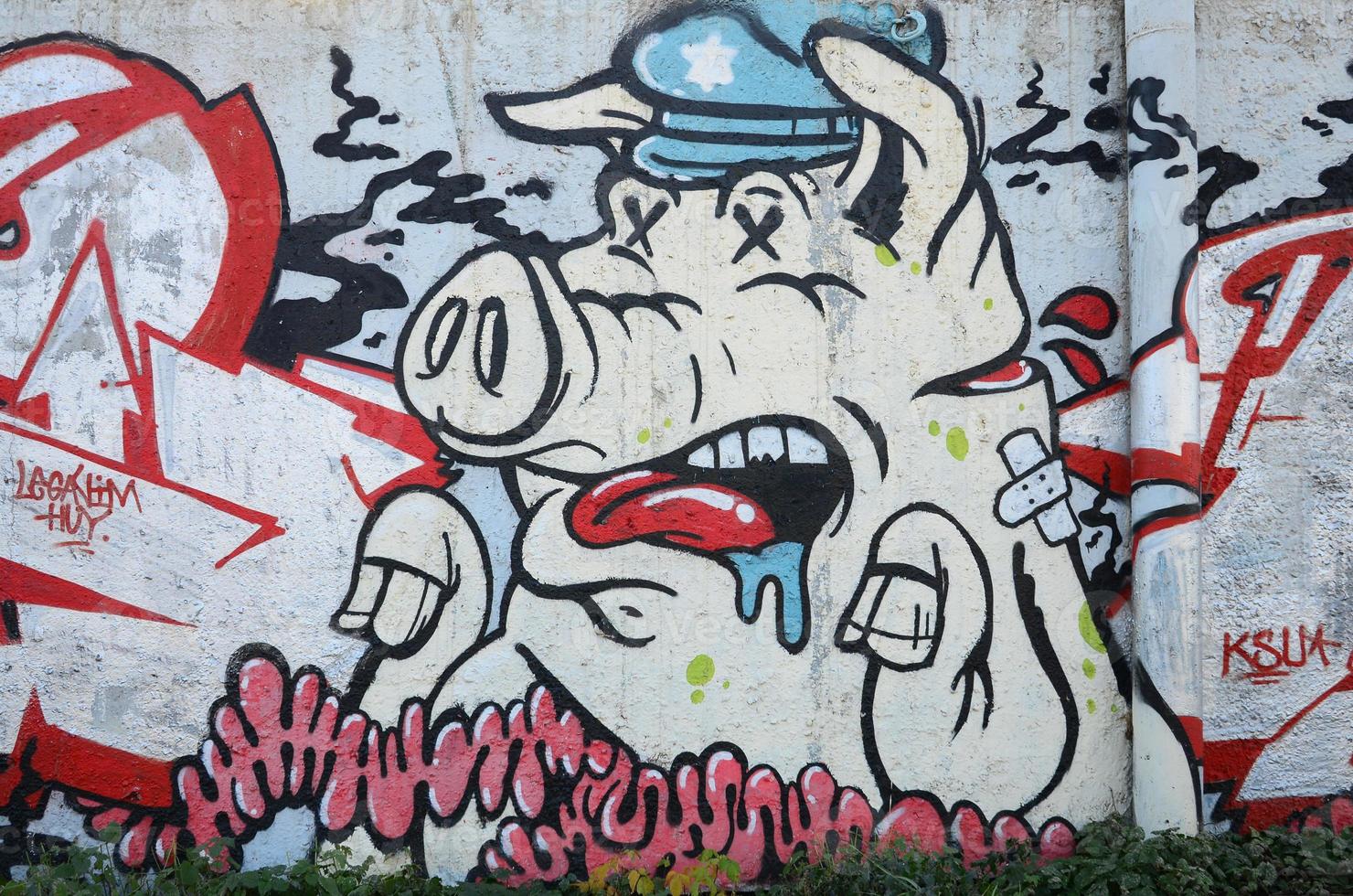 Texture of a fragment of the wall with graffiti painting, which is depicted on it. An image of a piece of graffiti drawing as a photo on street art and graffiti culture topics