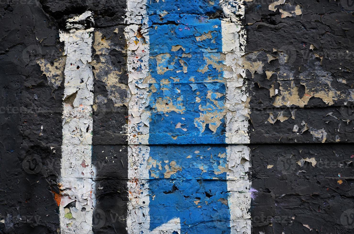 Street art. Colorful graffiti on the wall. Fragment for background. Abstract detail of a graffiti photo