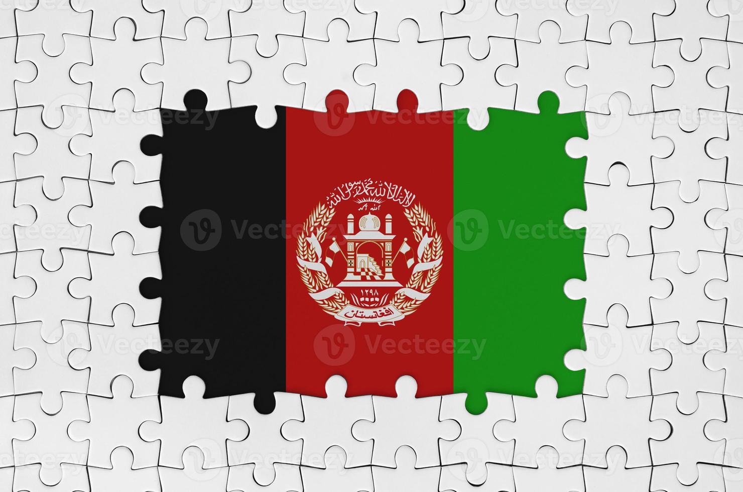 Afghanistan flag in frame of white puzzle pieces with missing central part photo