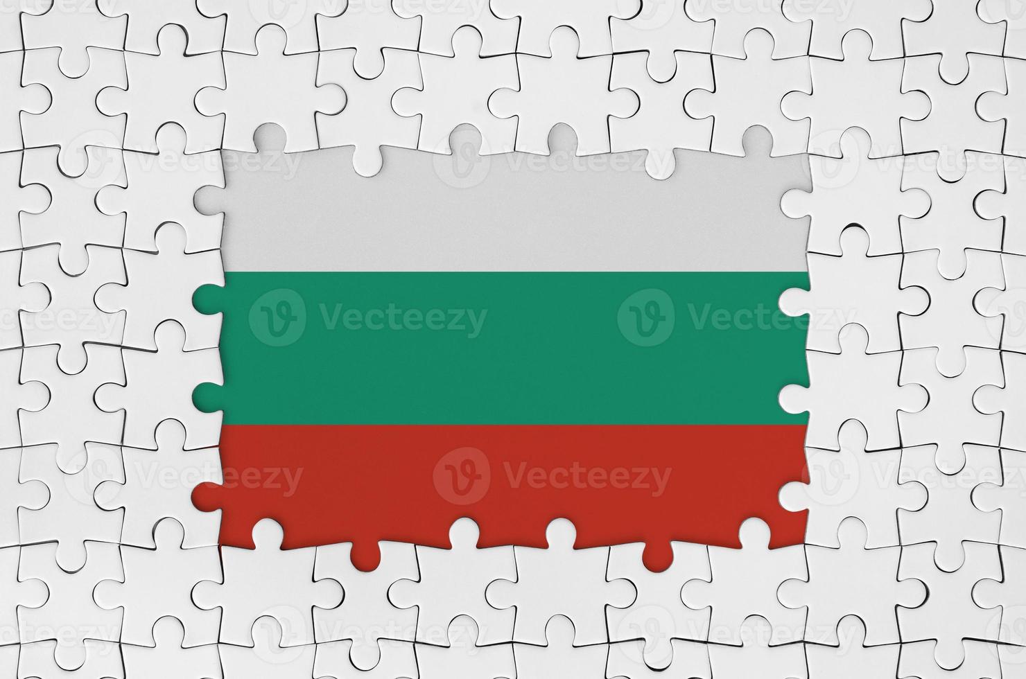 Bulgaria flag in frame of white puzzle pieces with missing central part photo