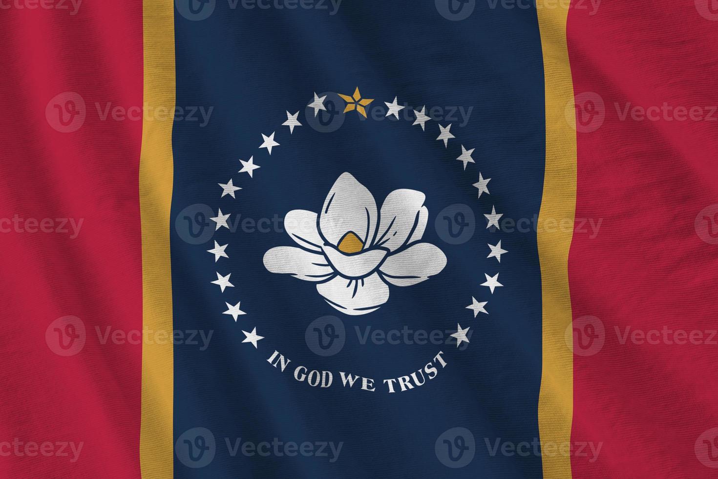 Mississippi new US state flag with big folds waving close up under the studio light indoors. The official symbols and colors in banner photo