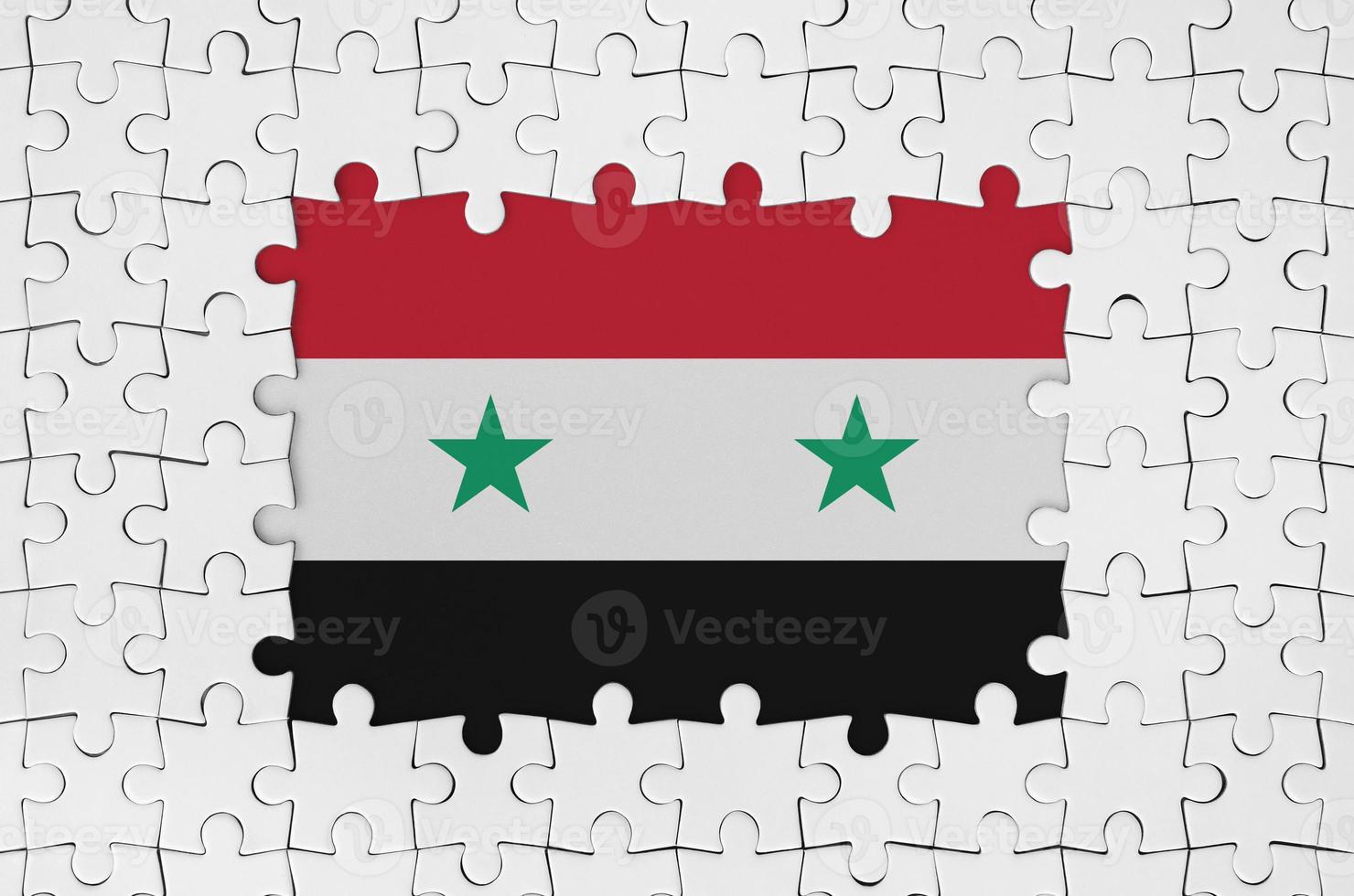 Syria flag in frame of white puzzle pieces with missing central part photo