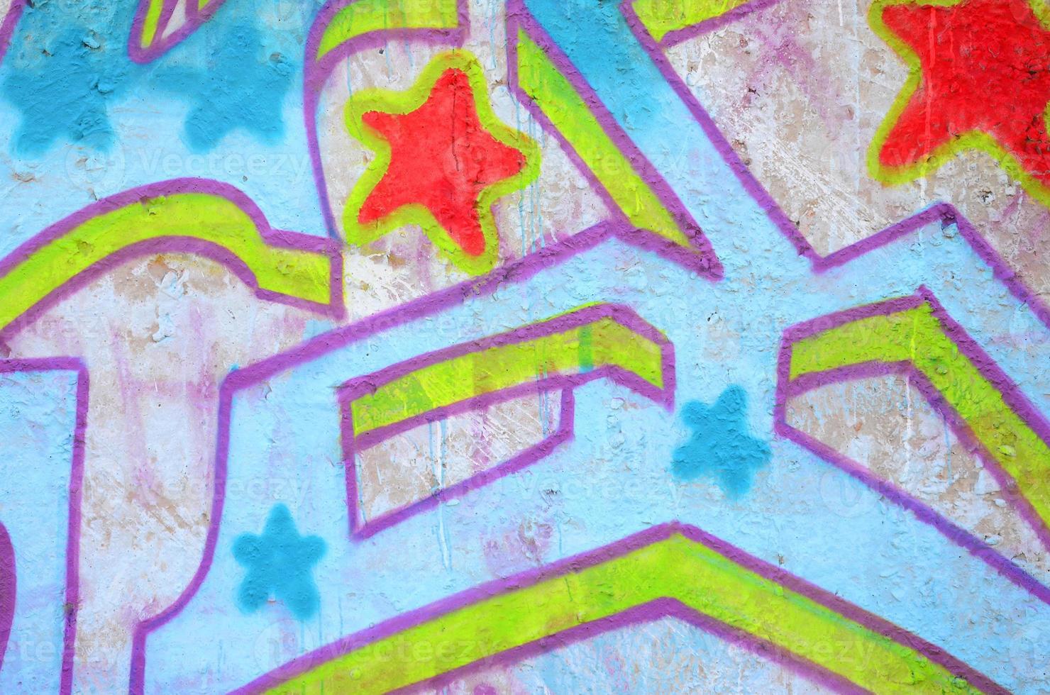 Texture of a fragment of the wall with graffiti painting, which is depicted on it. An image of a piece of graffiti drawing as a photo on street art and graffiti culture topics